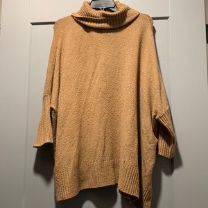 Beige loose turtleneck with large sleeves